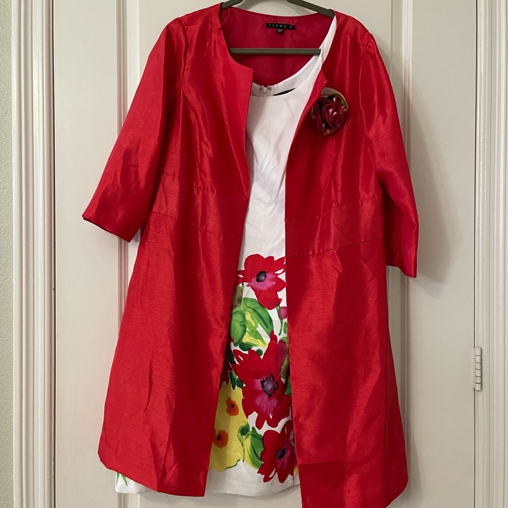 Tiana B. Red and white floral dress with red coat.